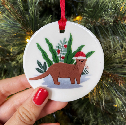Singapore Otter with Santa Hat Christmas Ornament